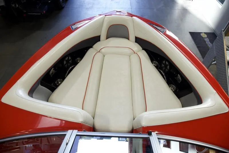 Slide: The Image of 2008 Centurion Enzo SV230 boat interior with red and white seating. - 14