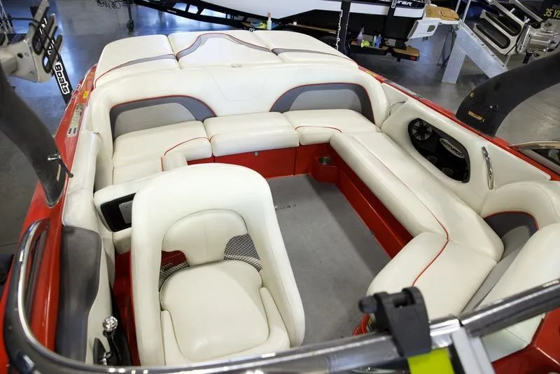 Slide: The Image of 2008 Centurion Enzo SV230 boat interior with white and red seating. - 16