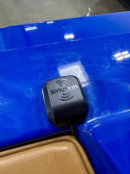 Slide: The Image of SiriusXM receiver on blue Axis T250 boat, 2022 model. - 21