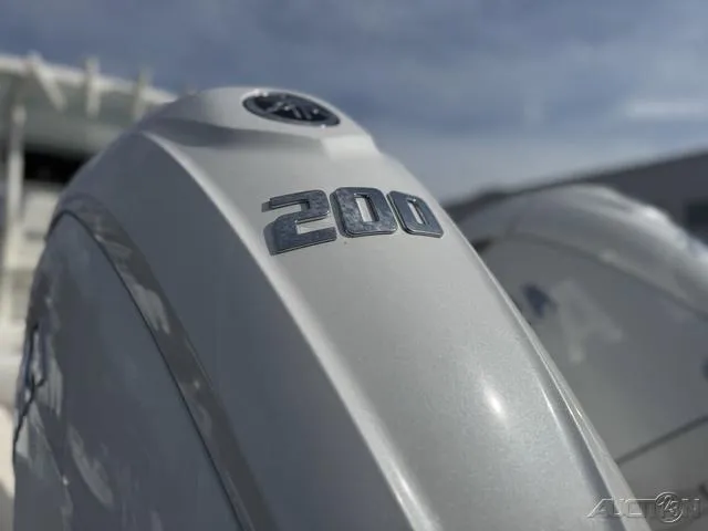 Slide: The Image of 2025 Key West 263 FS boat with Yamaha outboard engines, parked on a trailer. - 10
