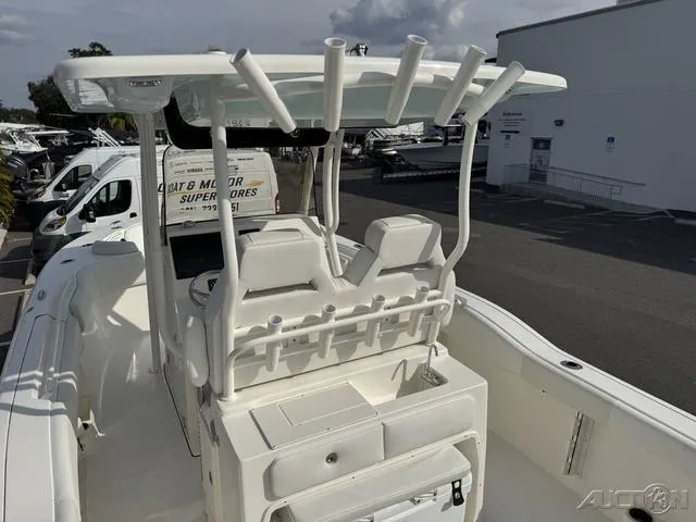 Slide: The Image of 2025 Key West 263 FS boat interior with seating and storage compartments. - 15