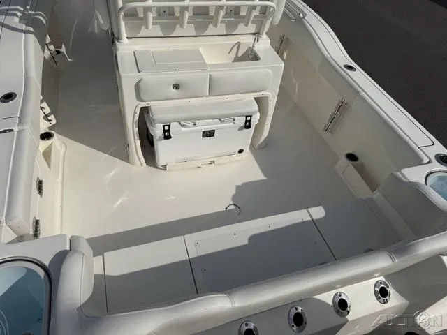 Slide: The Image of 2025 Key West 263 FS boat interior with sink and storage compartments. - 16