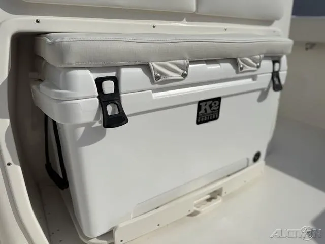 Slide: The Image of 2025 Key West 263 FS boat detail, featuring a livewell and cup holder. - 18