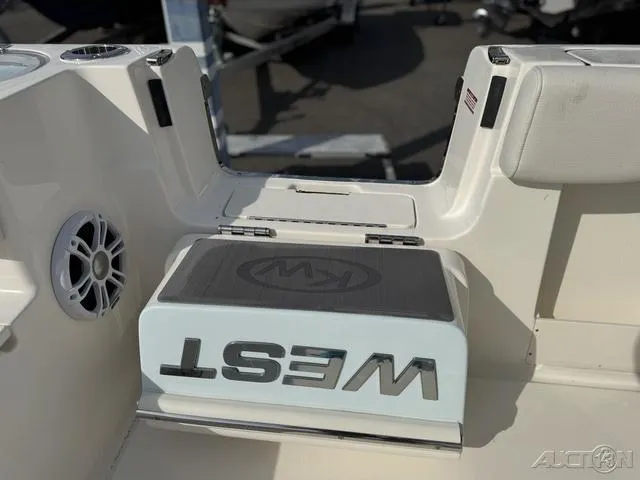 Slide: The Image of 2025 Key West 263 FS boat interior with modern helm and seating. - 24