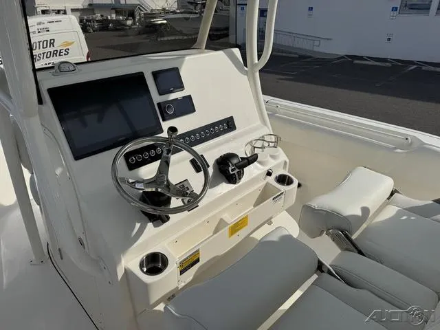 Slide: The Image of 2025 Key West 263 FS boat dashboard with modern navigation and control systems. - 29