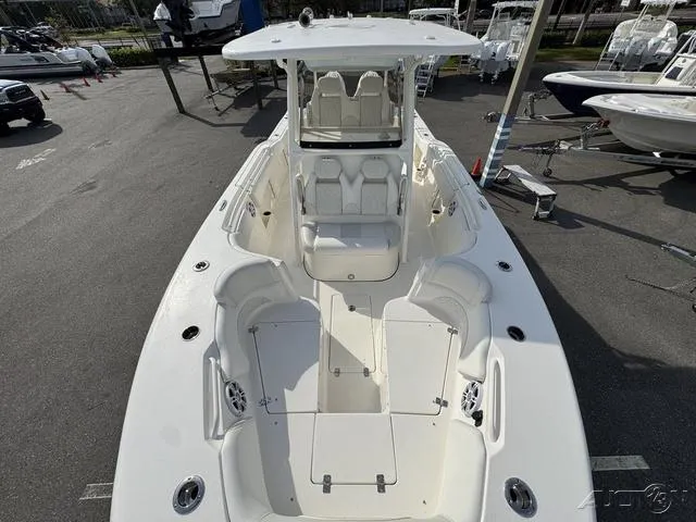 Slide: The Image of 2025 Key West 263 FS boat with open storage compartments. - 40