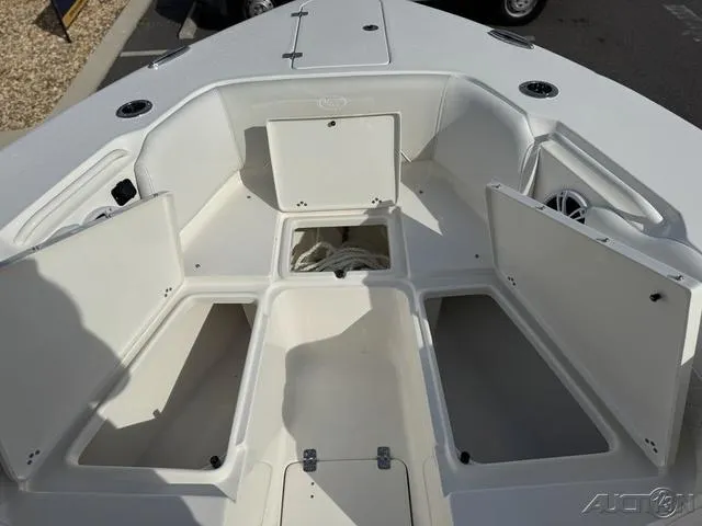 Slide: The Image of 2025 Key West 263 FS boat interior with open storage compartments. - 41