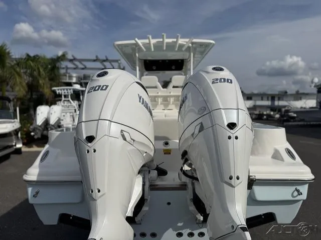Slide: The Image of Close-up of a 2025 Key West 263 FS boat engine with "200" emblem. - 9