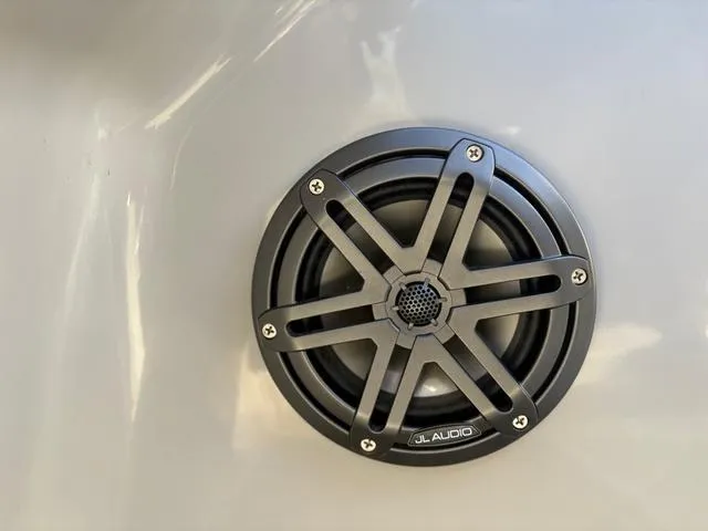 Slide: The Image of JL Audio speaker on 2022 Starcraft MX 25 Q DC Tritoon. - 7