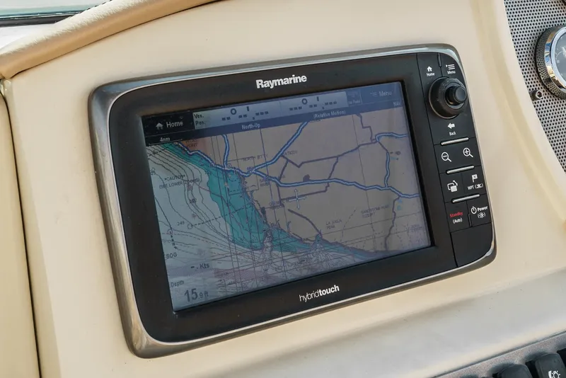 Slide: The Image of Raymarine navigation system on 2012 Chris-Craft Corsair 28 boat dashboard. - 17