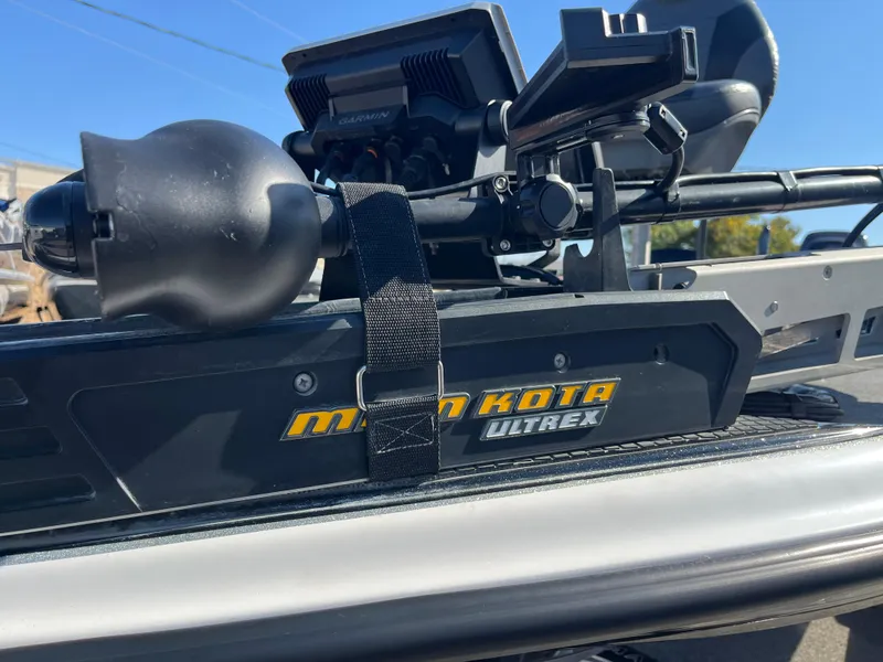 Slide: The Image of Minn Kota Ultrex trolling motor on 2013 Triton 21 HP boat. - 58