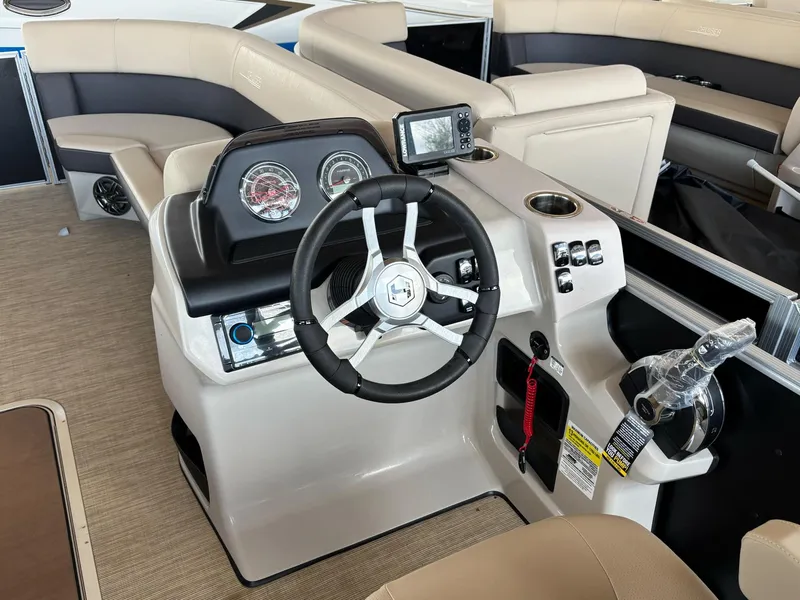 Slide: The Image of 2025 Harris CRUISER 230 SLDH boat interior with steering wheel and dashboard controls. - 4