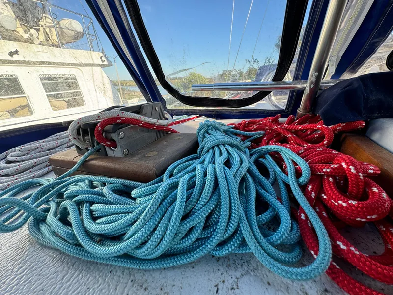 Slide: The Image of Colorful ropes on 1983 Islander Freeport sailboat deck. - 37