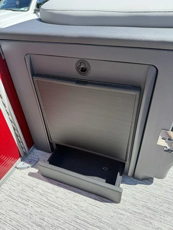 Slide: The Image of Storage compartment on 2025 Bennington 22 MSB boat, featuring a sleek, modern design. - 29