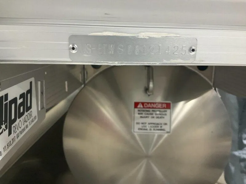 Slide: The Image of 2025 Bennington 22 MSB boat identification plate with warning label and ladder branding. - 35