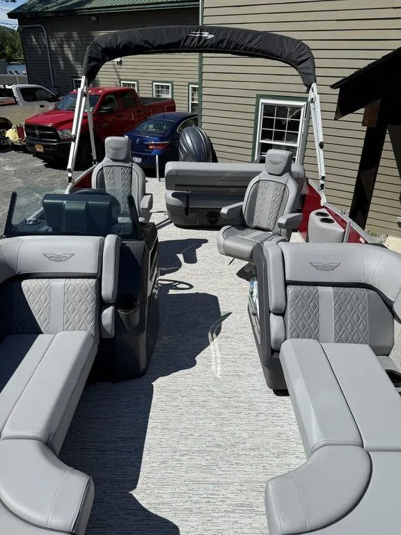 Slide: The Image of 2025 Bennington 22 MSB pontoon boat with luxurious gray seating and modern design. - 36