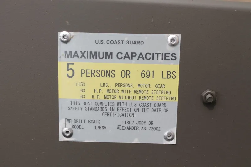 Slide: The Image of 2024 WeldBilt 1756V capacity plate, 5 persons or 691 lbs, U.S. Coast Guard compliant. - 10