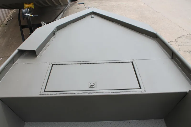 Slide: The Image of 2024 WeldBilt 1756V boat deck with storage compartment, gray finish. - 7