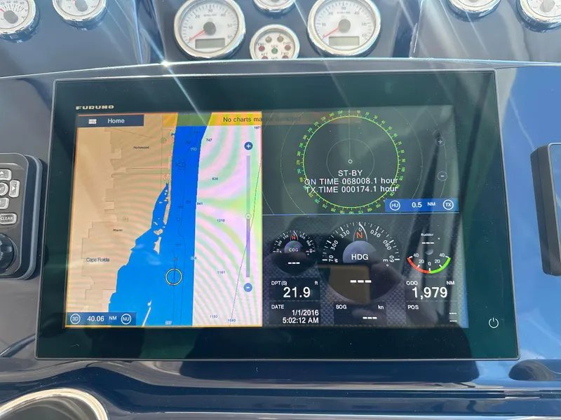 Slide: The Image of Navigation display on 2016 Tiara Yachts 3100 Coronet showing map and gauges. - 13