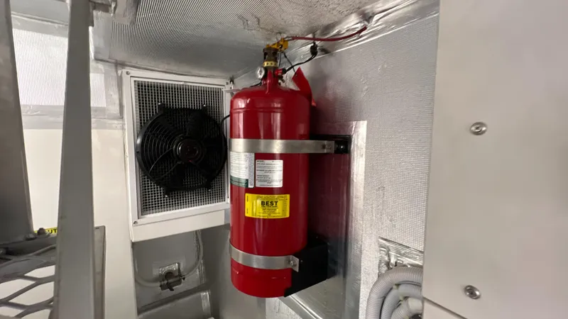 Slide: The Image of Fire extinguisher and ventilation fan in 2021 Maritimo X60 yacht interior. - 28