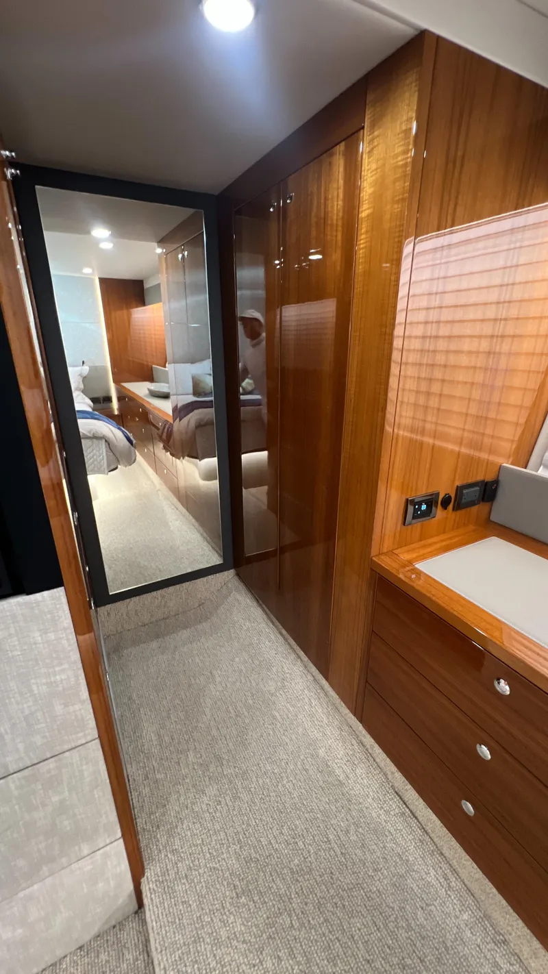 Slide: The Image of Interior of 2021 Maritimo X60 yacht with wood paneling and modern design. - 37