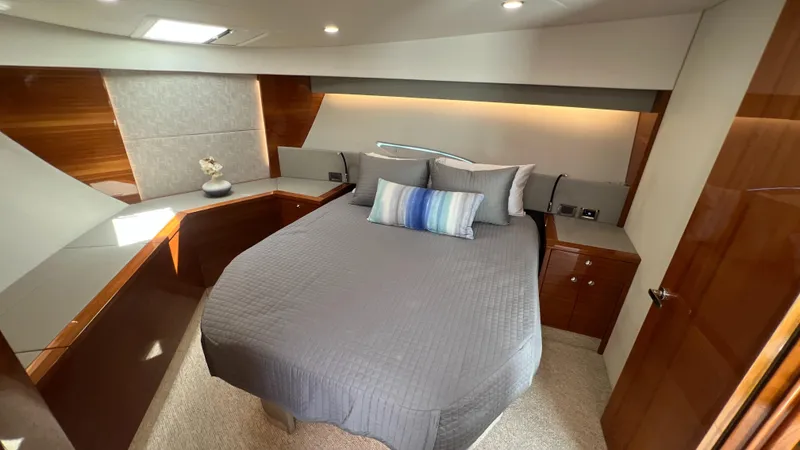 Slide: The Image of Luxurious bedroom interior of 2021 Maritimo X60 yacht with modern design and cozy bedding. - 40