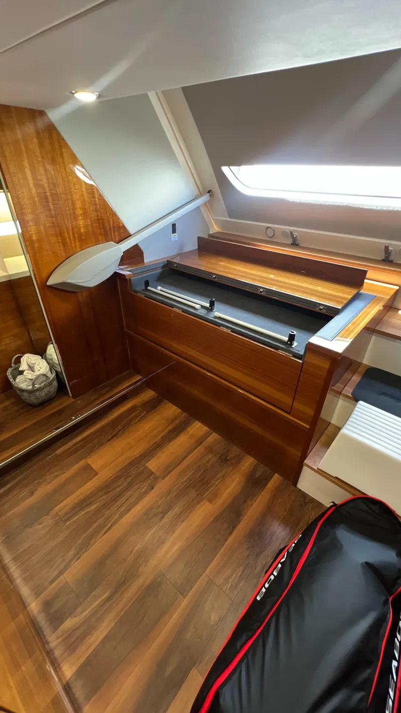 Slide: The Image of 2021 Maritimo X60 yacht interior with wooden flooring and modern design. - 47