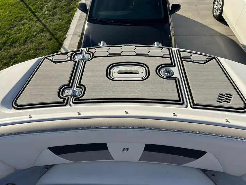 Slide: The Image of 2018 Four Winns HD220 boat deck with sleek design and modern fittings. - 17