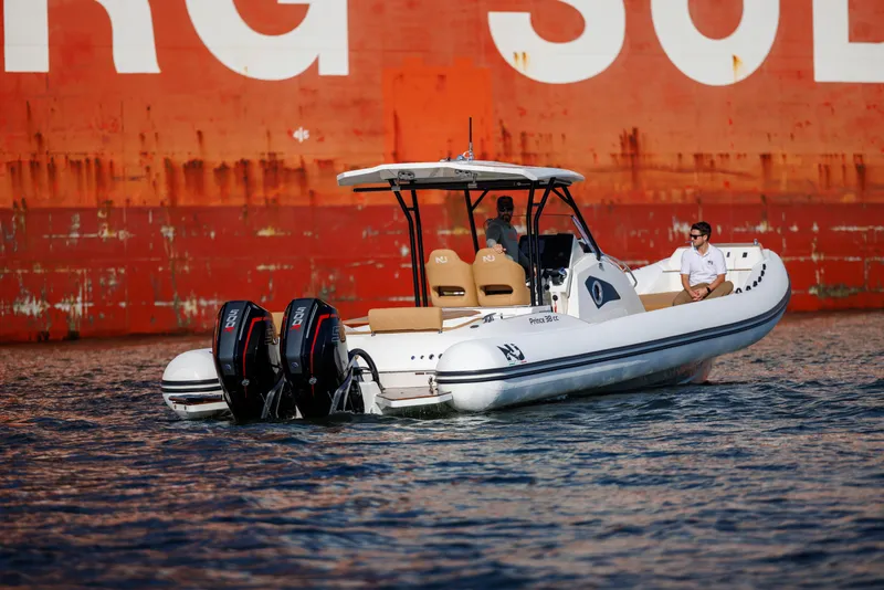 Slide: The Image of 2024 Nuova Jolly Prince 38 boat cruising on water with dual engines. - 18