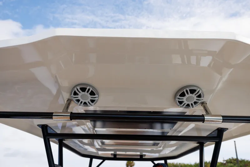 Slide: The Image of Nuova Jolly Prince 38 boat roof speakers, 2024 model, under a clear blue sky. - 32