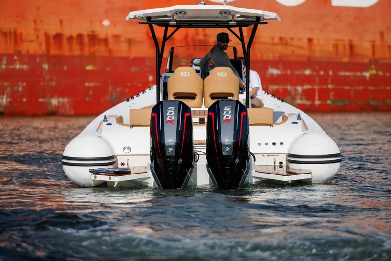 Slide: The Image of 2024 Nuova Jolly Prince 38 boat with dual engines on water. - 4
