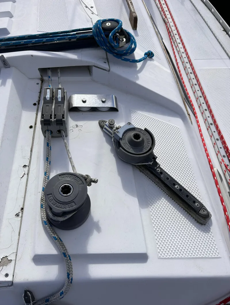 Slide: The Image of Deck of 1983 Hunter 34 sailboat with winches and ropes. - 16