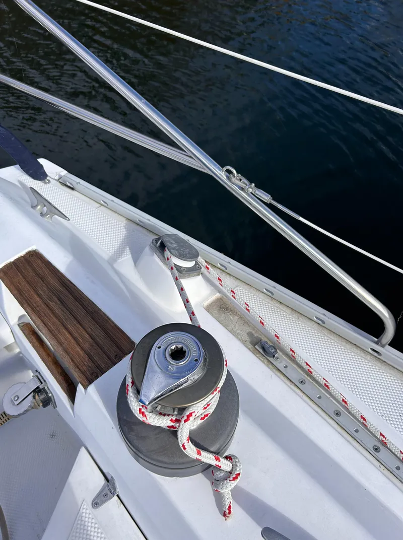 Slide: The Image of 1983 Hunter 34 sailboat deck with winch and rope detail. - 24
