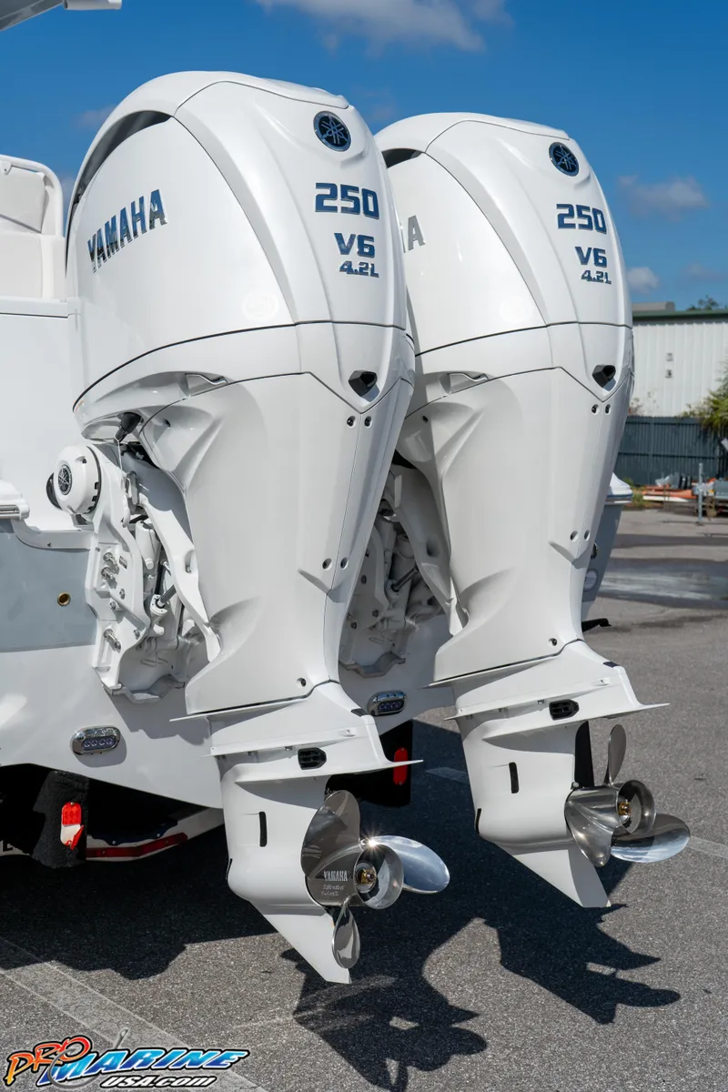 Slide: The Image of Twin Yamaha 250 V6 outboard engines on a 2025 Sea Hunt Gamefish 27 boat. - 23