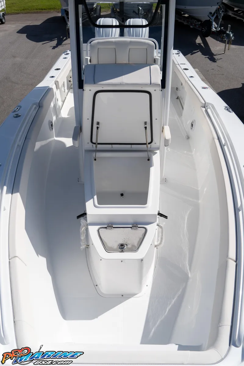 Slide: The Image of 2025 Sea Hunt Gamefish 27 boat with coffin box, spacious deck, and sleek design. - 46