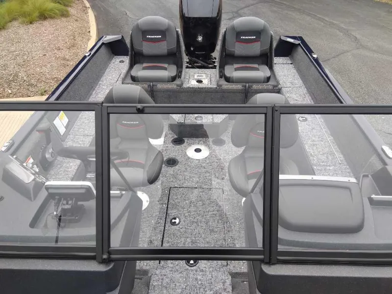 Slide: The Image of 2025 Tracker Pro Guide V-175 WT boat interior with seating and windshield. - 4