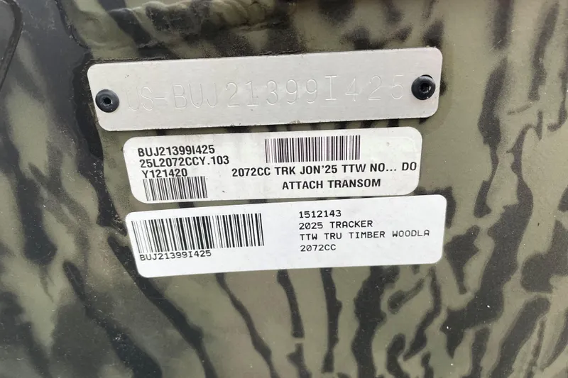 Slide: The Image of 2025 Tracker Grizzly 2072 CC boat identification labels on camouflage background. - 12