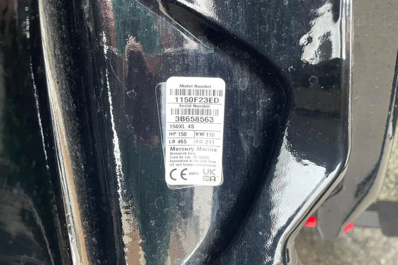 Slide: The Image of Label on 2025 Tracker Grizzly 2072 CC boat, displaying model and serial numbers. - 13