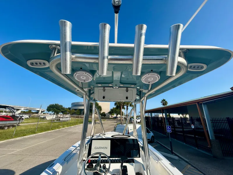 Slide: The Image of 2023 Sea Hunt Ultra 219 boat with T-top and Garmin electronics. - 16