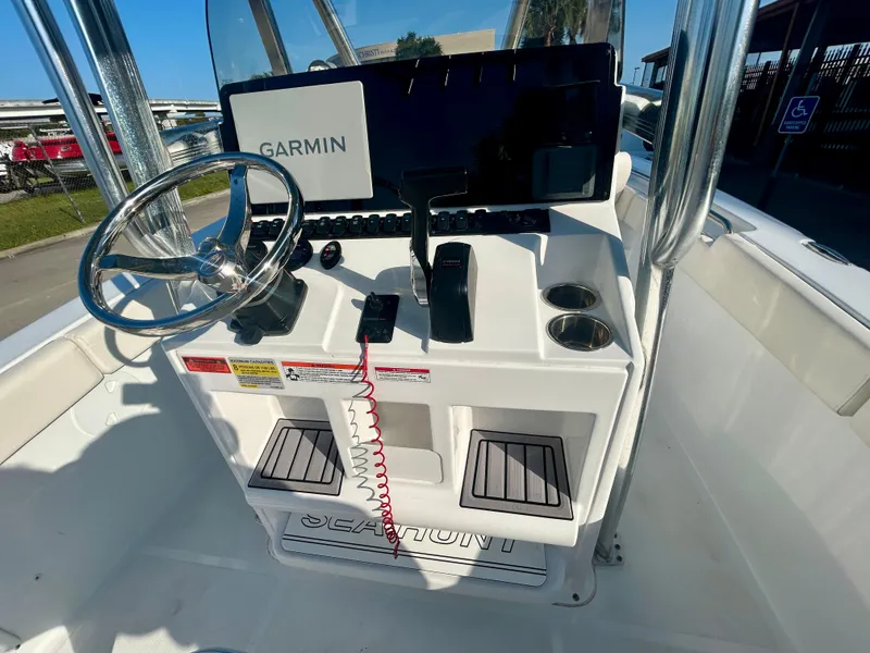 Slide: The Image of 2023 Sea Hunt Ultra 219 boat console with Garmin navigation system. - 18