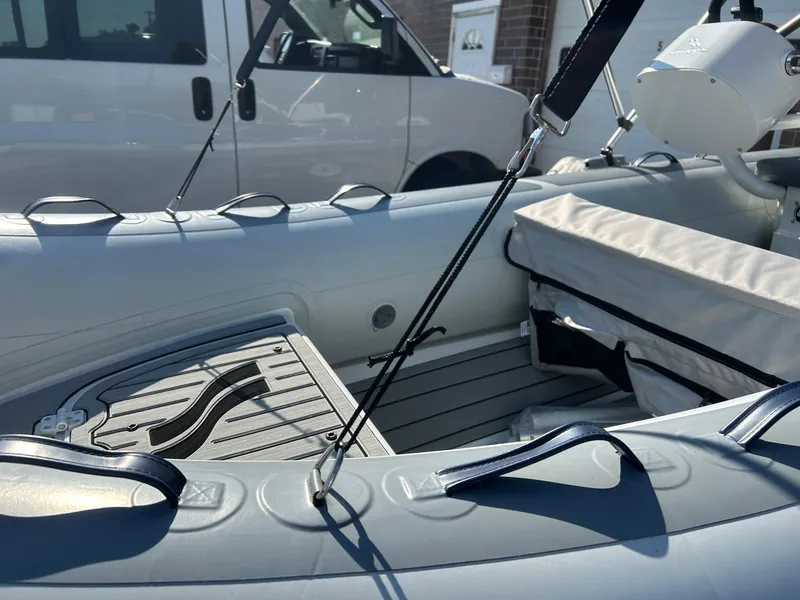 Slide: The Image of 2023 Highfield Classic 380 FCT inflatable boat interior with seating and deck details. - 8