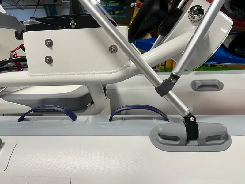 Slide: The Image of 2023 Highfield Classic 380 FCT boat interior details with metal and plastic components. - 9