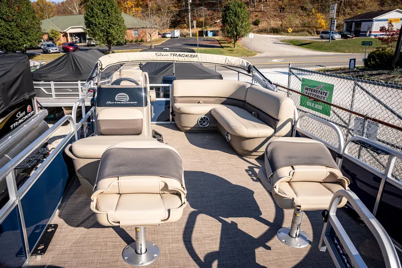Slide: The Image of 2025 Sun Tracker Bass Buggy 16 DLX pontoon boat with spacious seating and modern design. - 6