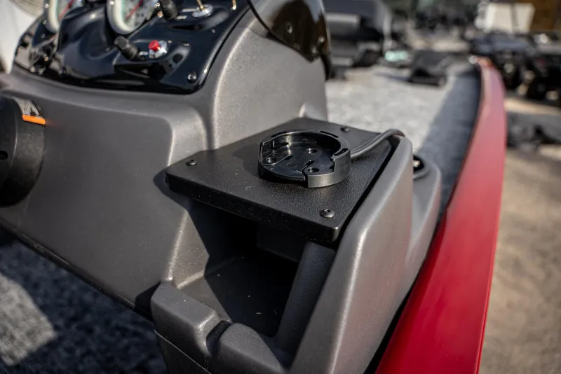 Slide: The Image of 2025 Bass Tracker Pro Team 170 boat dashboard with control panel. - 13