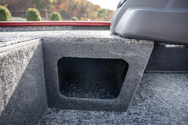Slide: The Image of 2025 Bass Tracker Pro Team 170 boat interior storage compartment. - 9