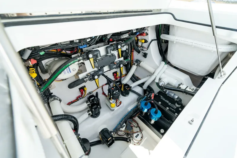 Slide: The Image of Engine compartment of 2025 Valhalla Boatworks V-29 Hybrid, showcasing advanced wiring and components. - 14