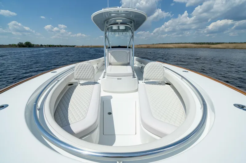 Slide: The Image of 2025 Valhalla Boatworks V-29 Hybrid on water, featuring luxurious seating and sleek design. - 4
