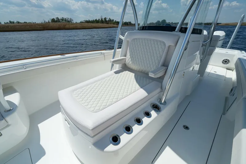 Slide: The Image of 2025 Valhalla Boatworks V-29 Hybrid with luxurious seating on open water. - 5