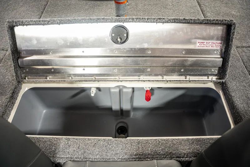 Slide: The Image of 2025 Bass Tracker PRO TEAM 190 boat storage compartment, open and empty. - 20