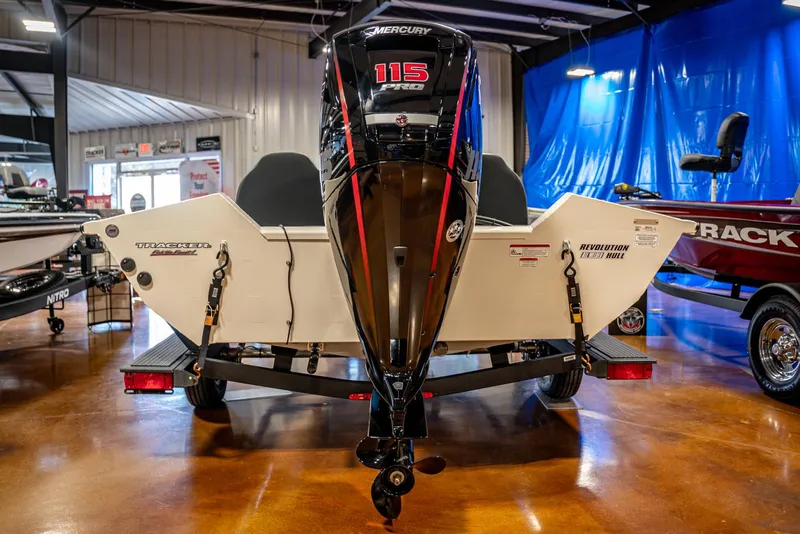 Slide: The Image of 2025 Bass Tracker PRO TEAM 190 boat with Mercury 115 engine in showroom. - 3